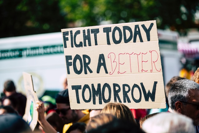 A sign with the text "Fight today for a better tomorrow" written on it the statement is a big lesson that if implemented correctly will change your life.